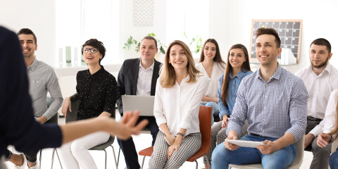 Young people having business training in office